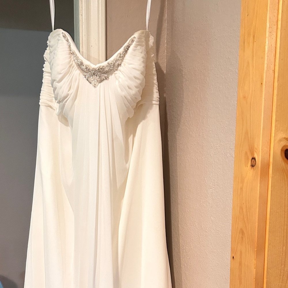 Elegant White Gown with Beaded Neckline